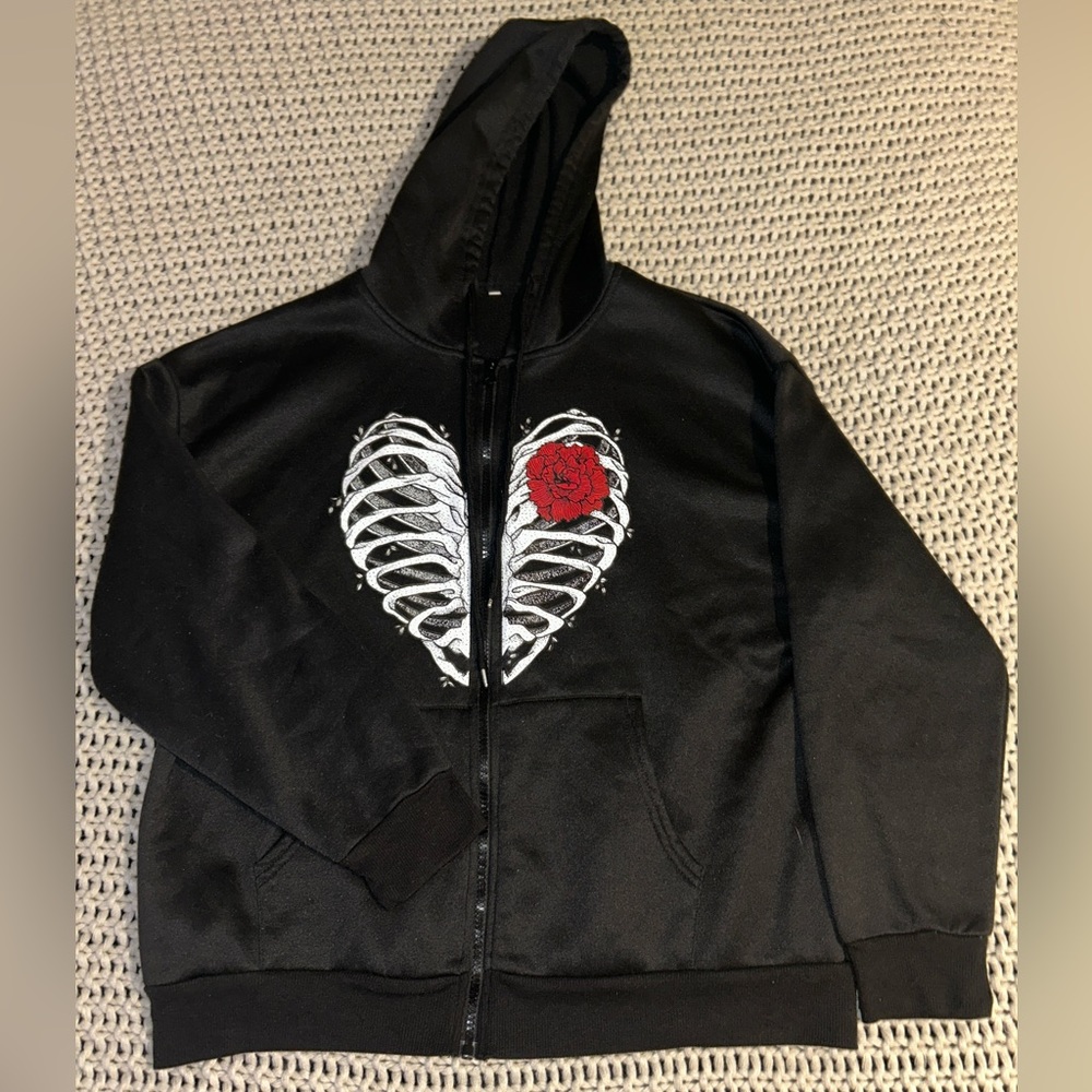 black zip up jacket w/ skeletal design